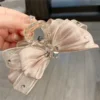 Luxury Sparkle Organza Bow Hair Claw Luxury Sparkle organza pink bow hair claw in Bangladesh