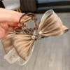 Luxury Sparkle Organza Bow Hair Claw Luxury Sparkle organza brown bow hair claw in Bangladesh