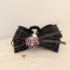 Black Vintage Camellia tweed bow hair claw in Bangladesh