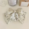 Snow Delight Hair Bow – Elegant White polka dot Bow