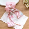 Sweet Floral Hair tie – Charming Bow Claw with Floral Design