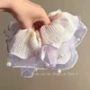 purple multi layered pearl hair tie